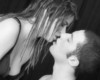 a teasing little kiss