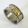 Titanium ring with gold dragon