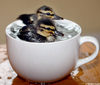 A cup of baby ducks